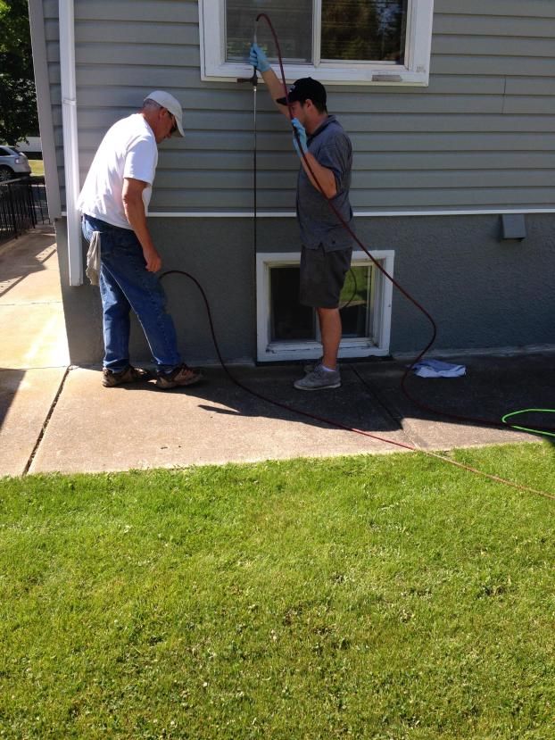 Using a 6ft long probe to fix leaks from the outside of the house.